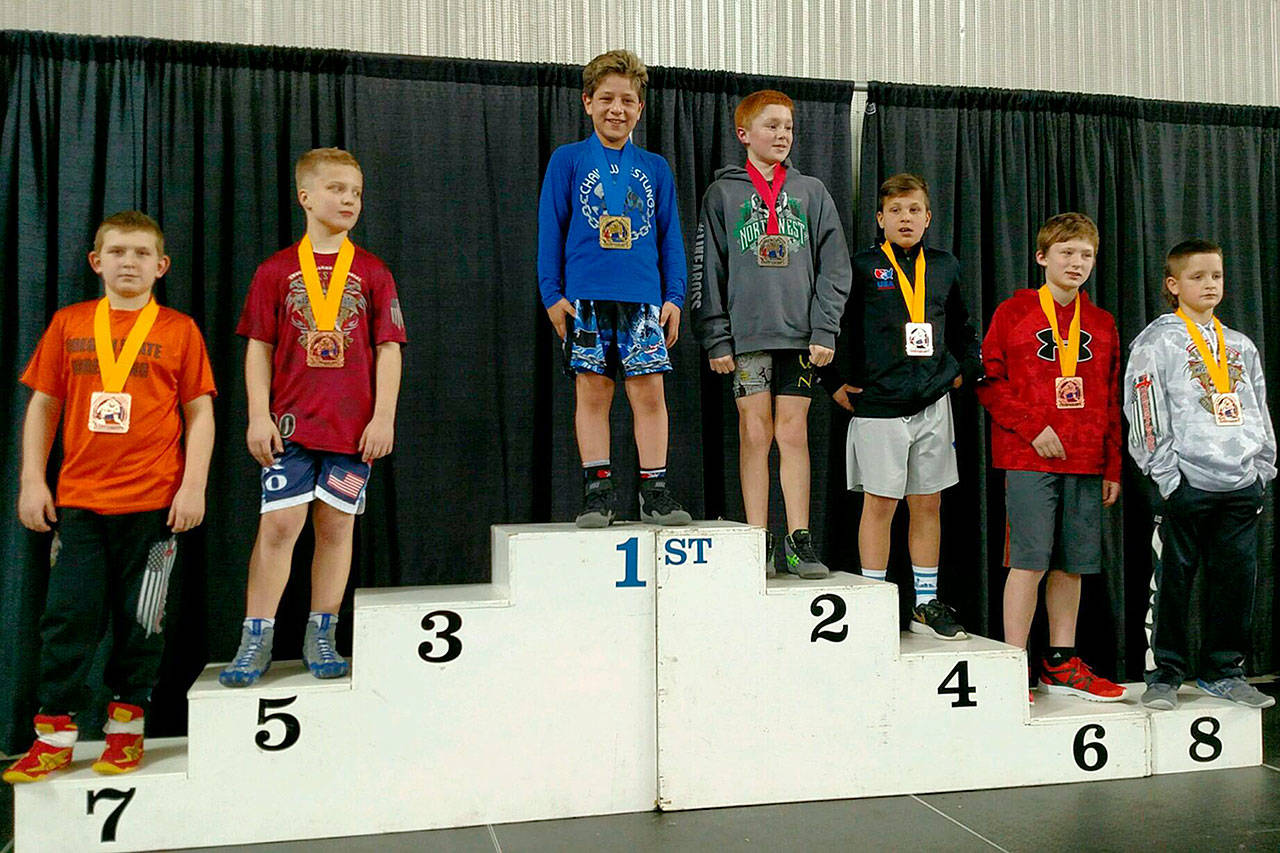 Contributed photo — Isaiah McClure, a fifth-grade Langley resident, won the novice 100-pound division of the Washington State Folkstyle Championships on Feb. 19 at the Tacoma Dome.