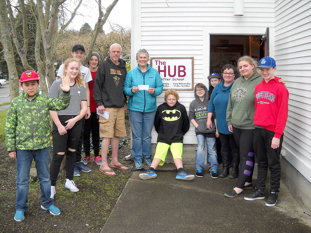 Contributed photo — Bayview Farmers Market president Shirlee Read presented a $500 donation to The HUB in early March. Also pictured are Bruce Allen, president of The HUB board, Shelly Rempa, program manager, Azrael Rempa, assistant, and a few of the regular HUB patrons.