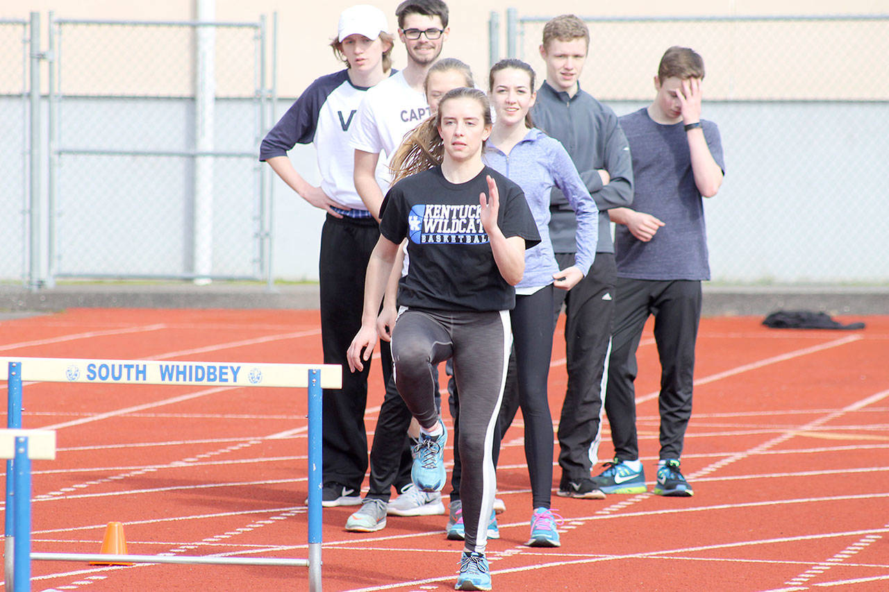 Evan Thompson / The Record &mdash; South Whidbey junior Sophia Nielsen practices her hurdling form at a recent track and field practice.