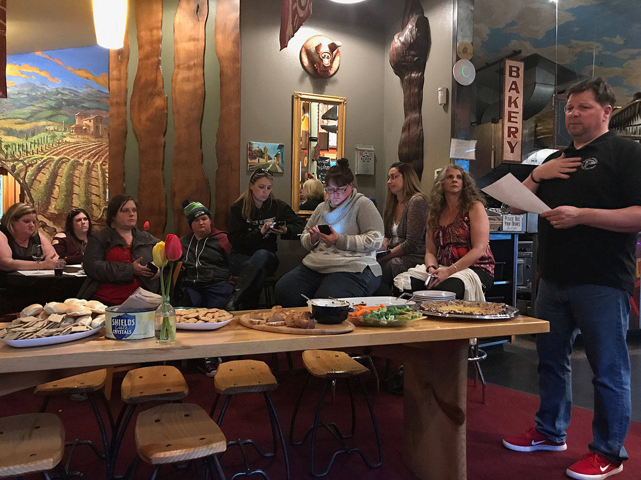 Contributed photo — Mark Hodson, South Whidbey football head coach, met with about 30 parents this past Wednesday night at Mukilteo Coffee Roasters to discuss a wide variety of topics, from concussion protocol to program traditions.