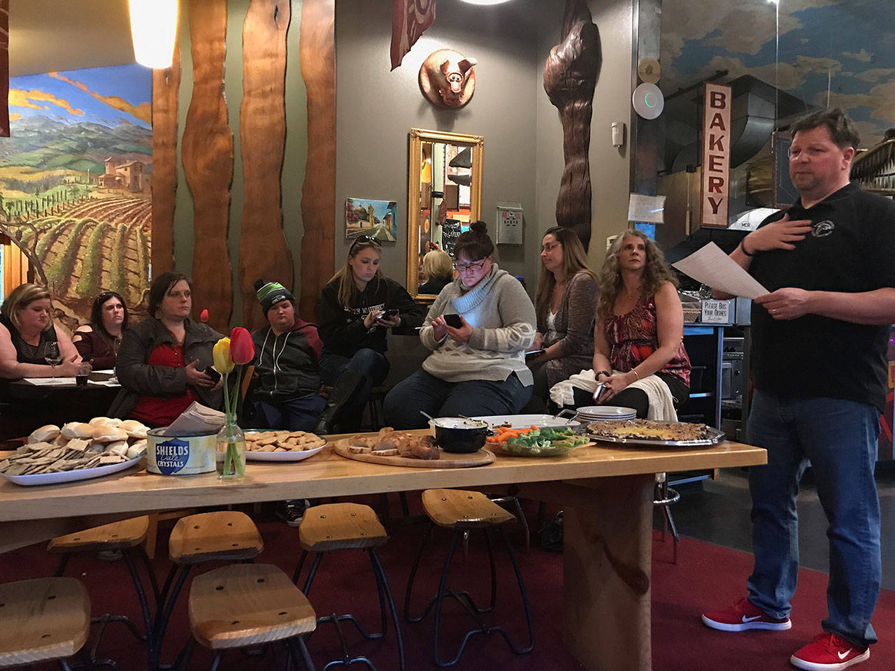 Contributed photo &mdash; Mark Hodson, South Whidbey football head coach, met with about 30 parents this past Wednesday night at Mukilteo Coffee Roasters to discuss a wide variety of topics, from concussion protocol to program traditions.