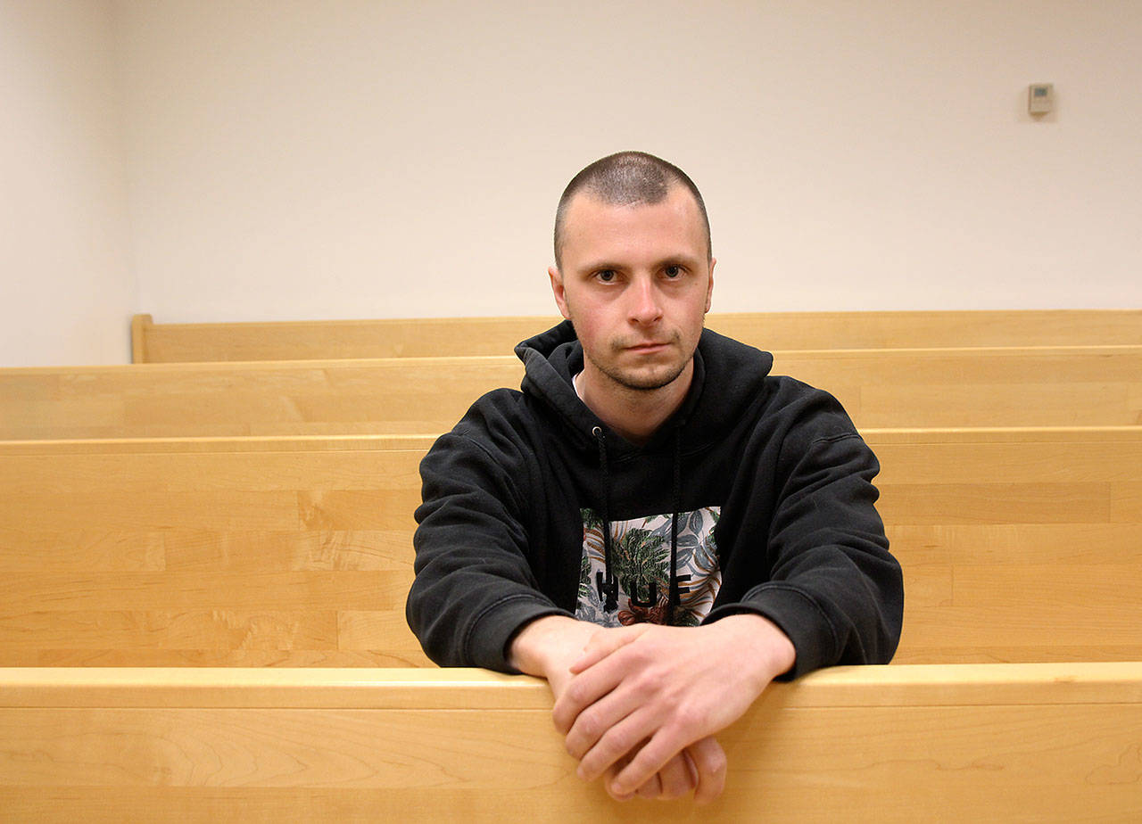 Photo by Jessie Stensland / Whidbey News-Times                                Kody Schwiger sits in the courtroom where he spent many hours as a participant in adult drugcourt. He recently graduated with the help of a medication that helps people with heroinaddiction.