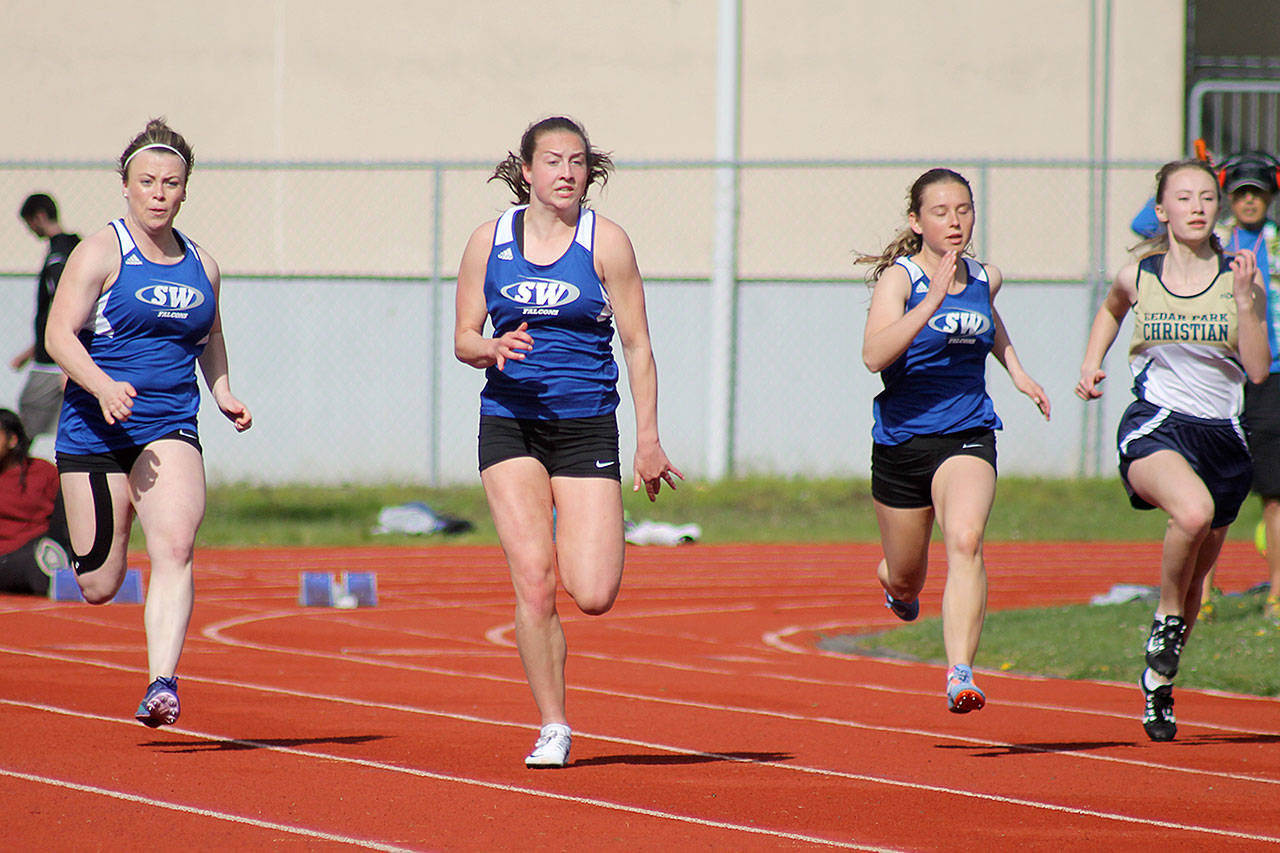 Evan Thompson / The Record — South Whidbey senior Bailey Forsyth, center, finished first in the 100-meter dash on Thursday in a three-way home meet against Sultan and Cedar Park Christian.