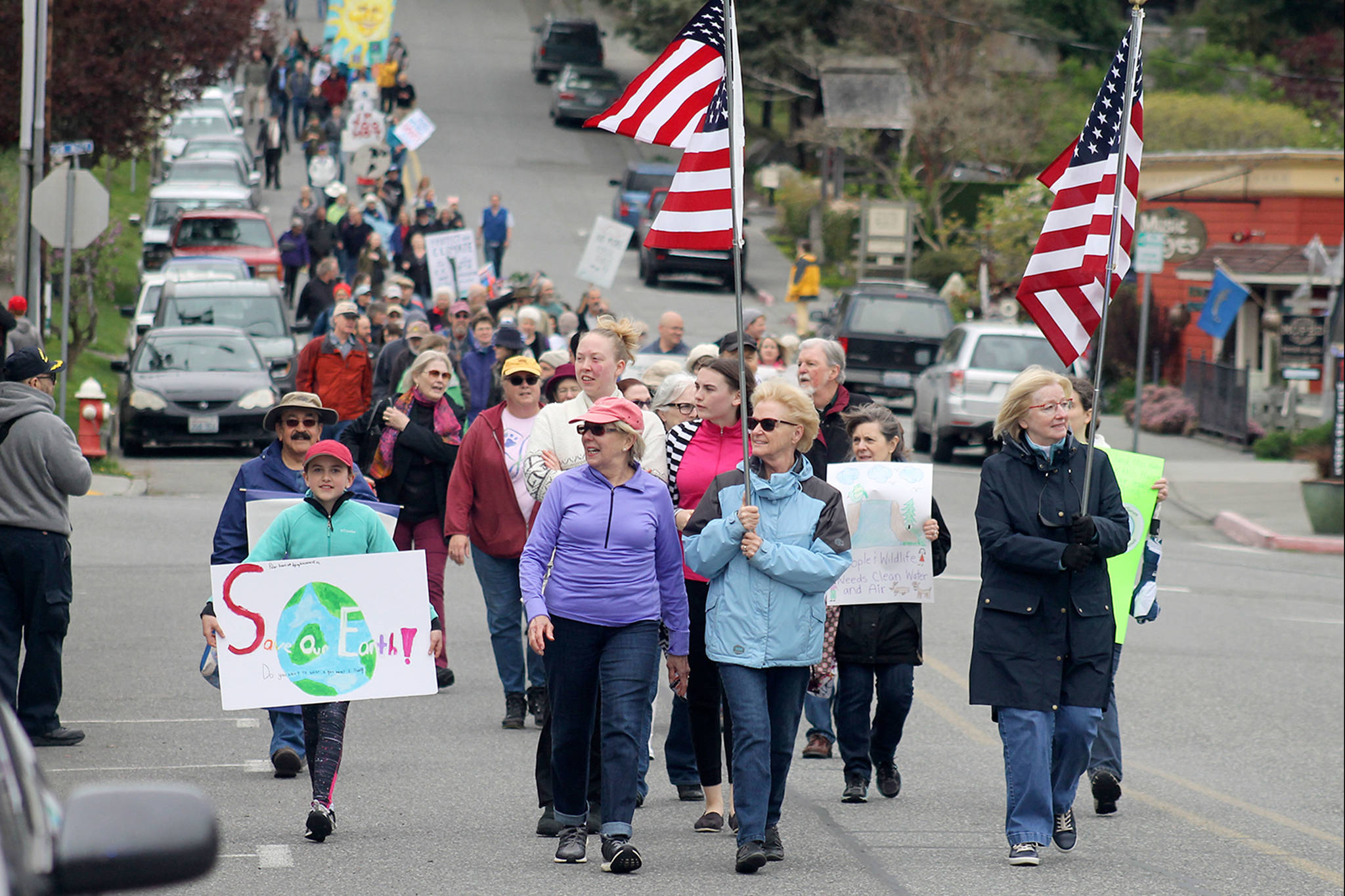 Hundreds participate in climate march through streets of Langley