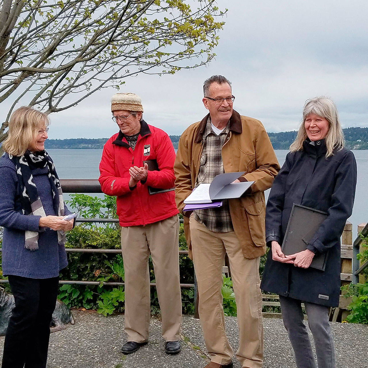 Contributed photo &mdash; Georgia Gerber, far right, received a certificate of recognition from Sculpture Northwest and a Mayor&rsquo;s Excellence Award pin during a ceremony on Saturday, April 22. From left to right: Pam Schell, George Drake, Mayor Tim Callison and Gerber.