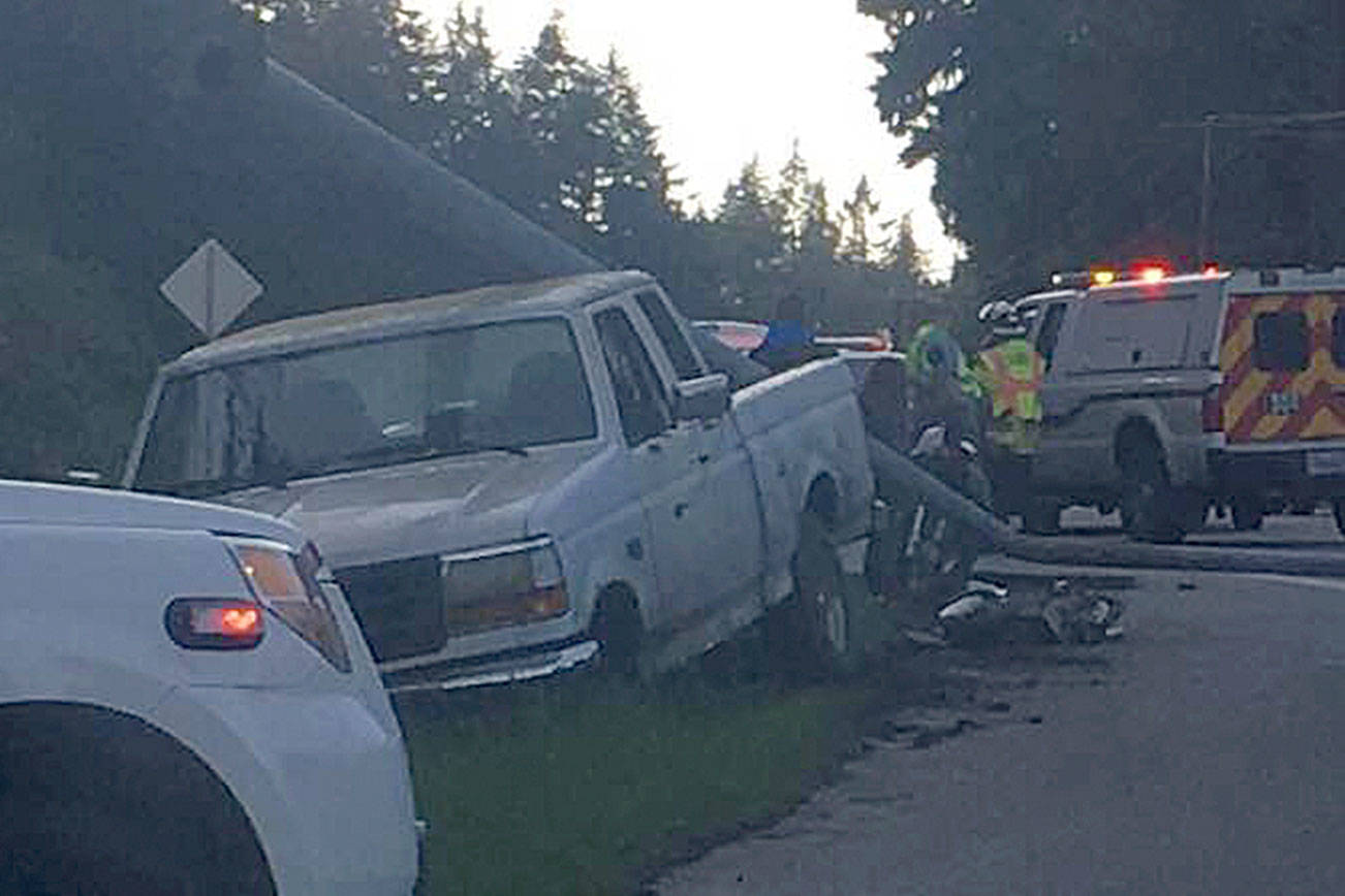 Pick-up truck takes out light pole in Clinton