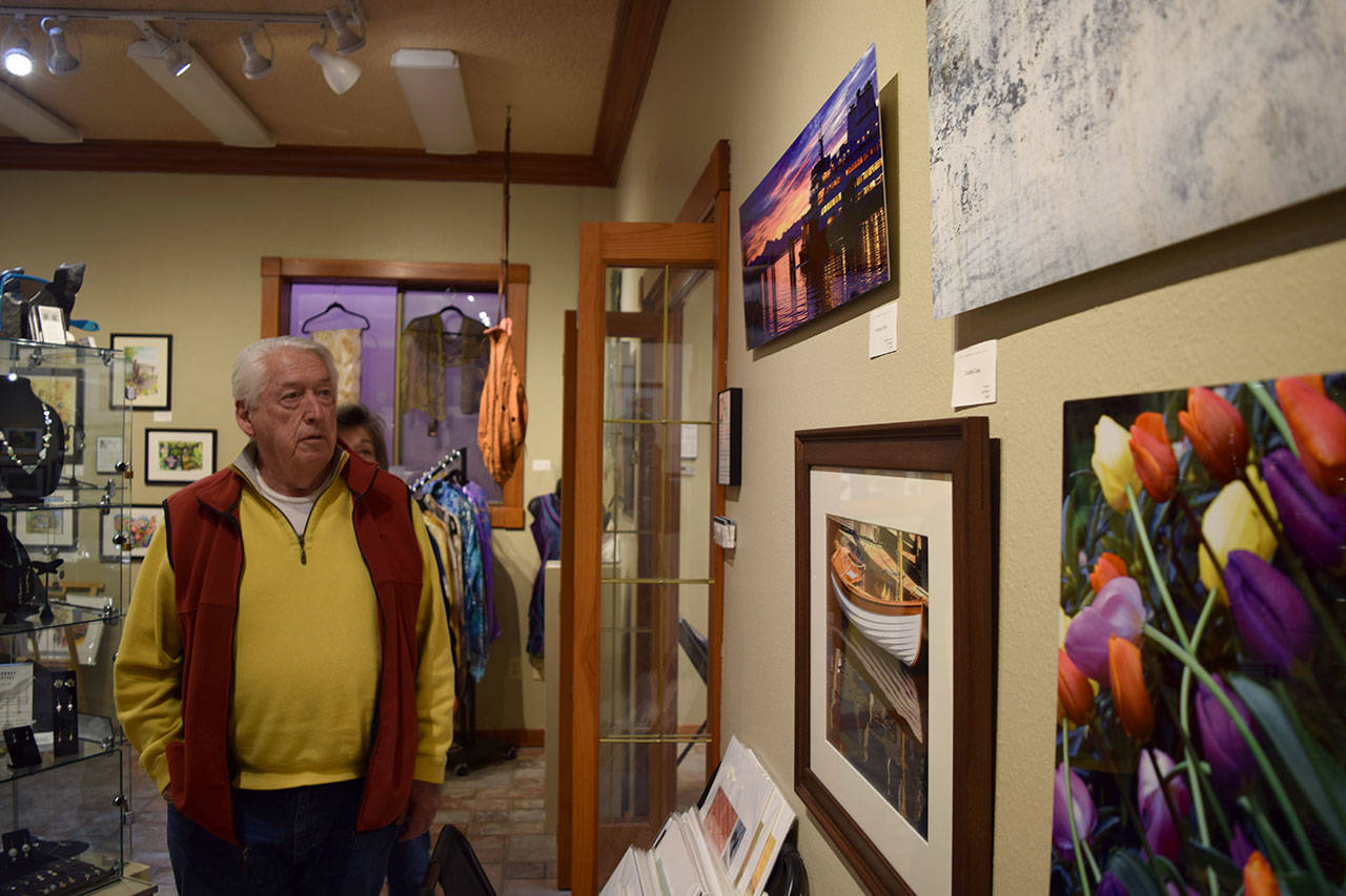 Kyle Jensen / The Record — Member photographer Tom Hanify has shown his photos at Whidbey Art Gallery for years. He says he never showed his work at a gallery before becoming a part owner of showroom.