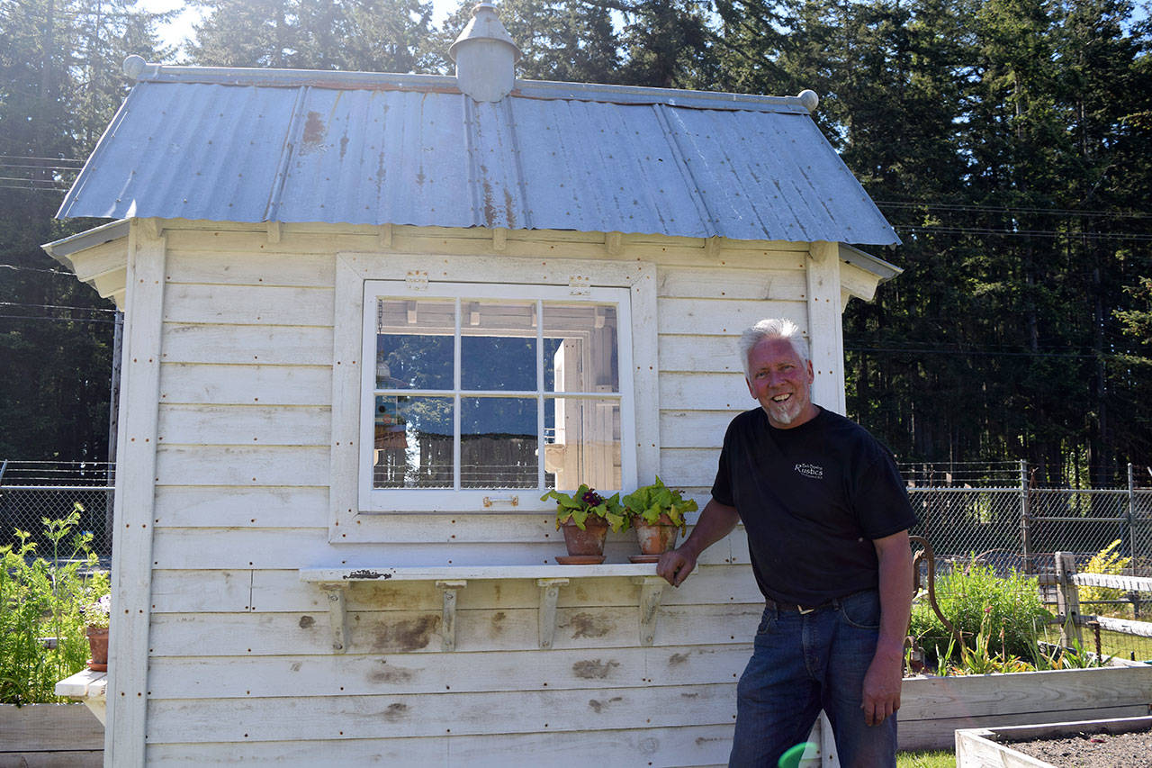 Kyle Jensen / The Record — Bayview resident Bob Bowling has won awards at the Northwest Flower and Garden Show for the presentation of his rustic sheds and chicken coops.