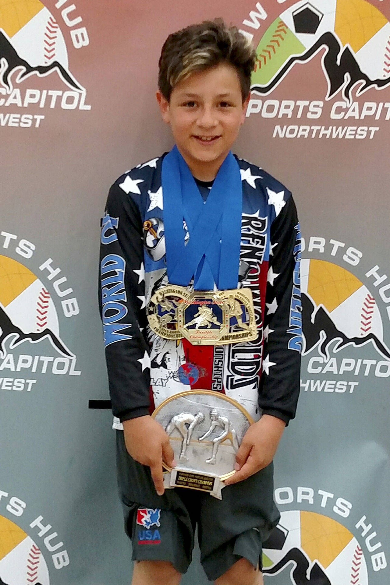 Contributed photo — Isaiah McClure, 11, won three state wrestling titles this year in Greco-Roman, freestyle and folkstyle.
