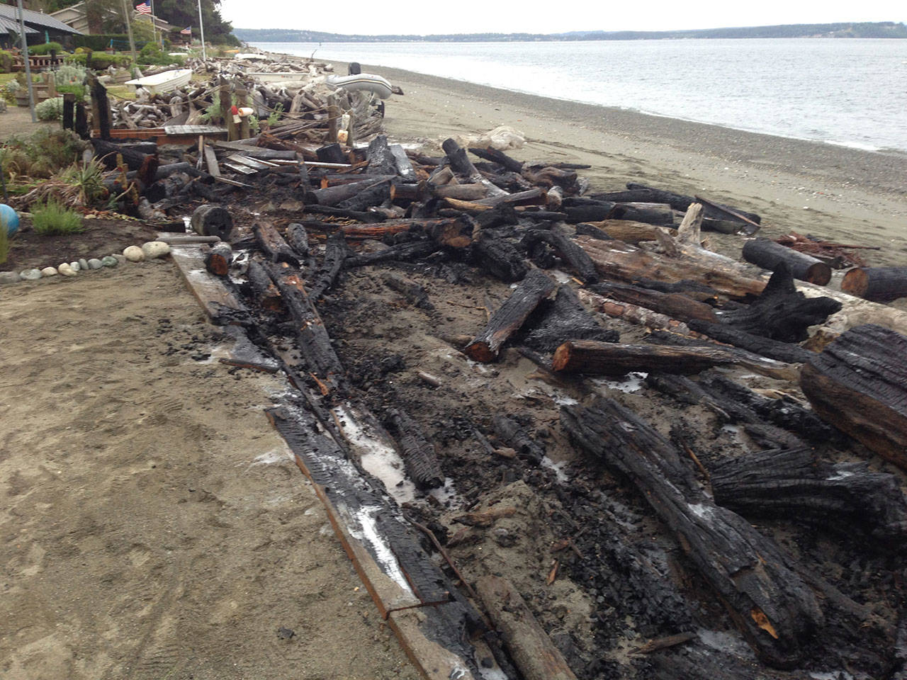 Driftwood blaze the result of unattended beach fire, official says
