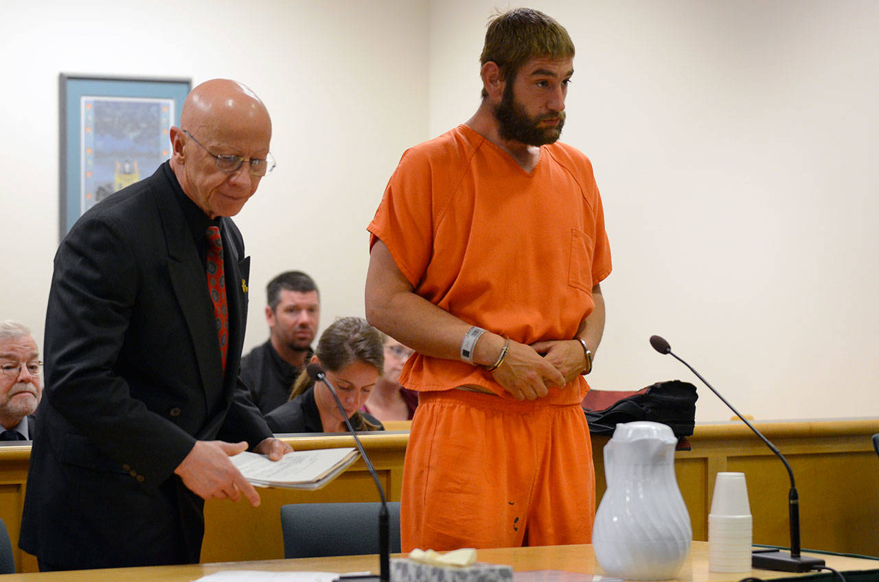 Justin Burnett/The Record — Jeffrey Lewellen, 30, enters a “not guilty” plea Monday in Island County Superior Court with his attorney, Steve McKay. Lewellen is charged with vehicular homicide in the death of Diane Sturlaugson, a 69-year-old Lake Stevens resident.