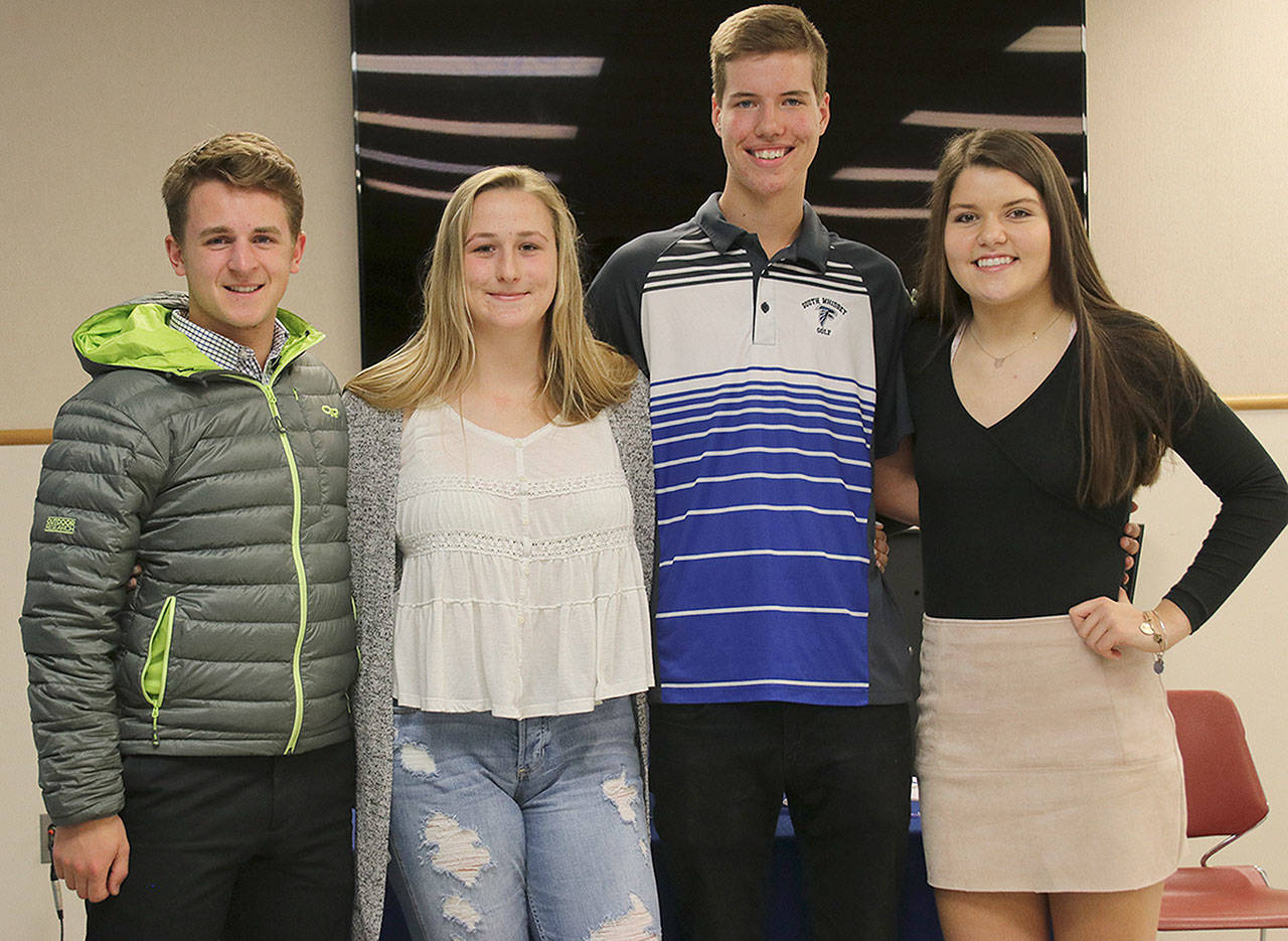 Matt Simms photo &mdash; Four of the seven Wall of Fame inductees pose for a photo. From left to right: Will Simms, Anna Leski, Anton Klein and Megan Drake. The other three inductees were Connor Antich, Bailey Forsyth and Kacie Hanson.