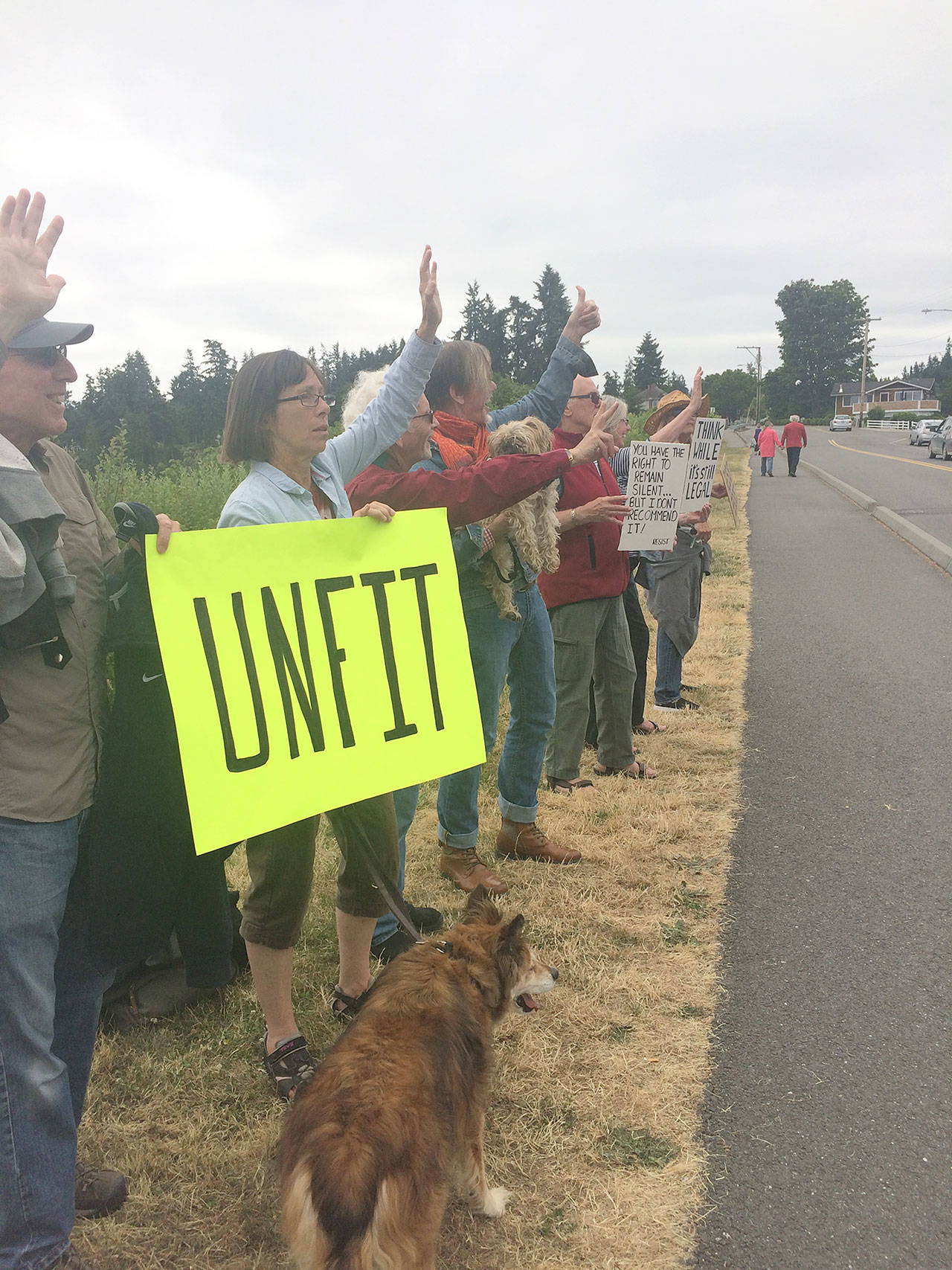 Evan Thompson / The Record — Around 40 people participated in a demonstration calling for President Donald Trump’s impeachment on Sunday along the sidewalk of Edgecliff Drive in Langley.
