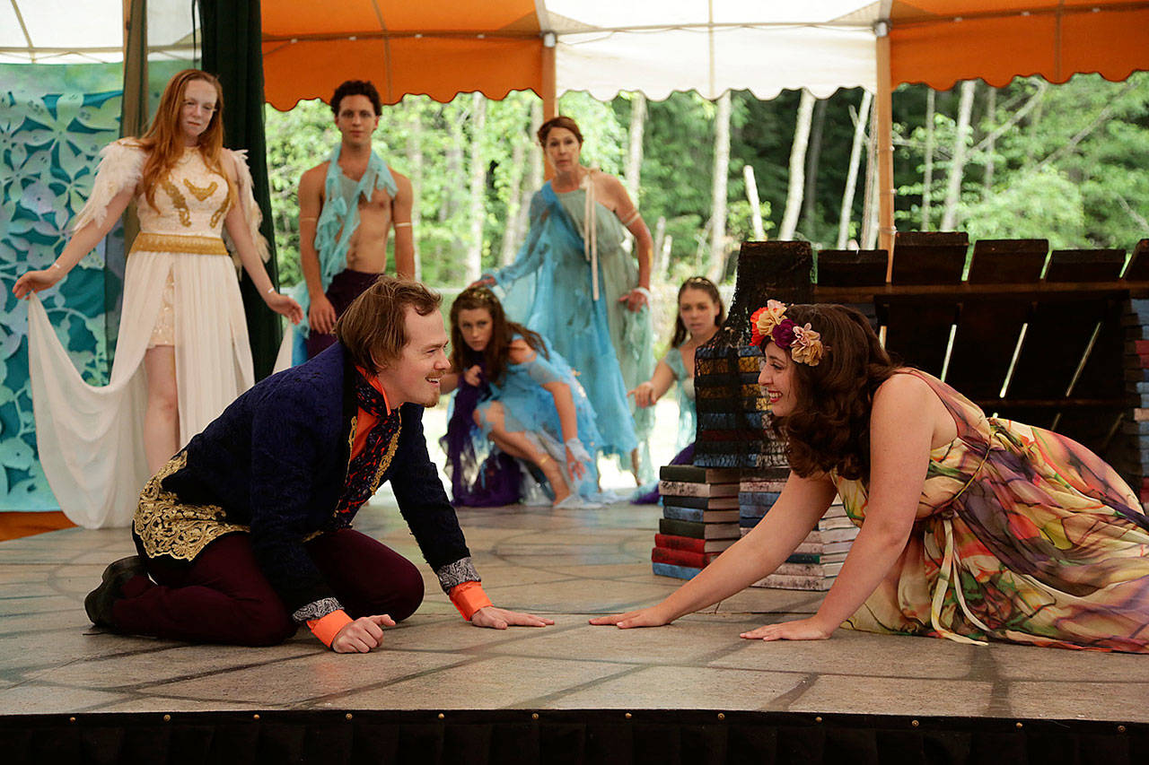 Record file — Actors perform The Tempest in 2015. In the scene, the character played by Tyler Kubat (left) falls in love with the character played by Katrina Lind (right).