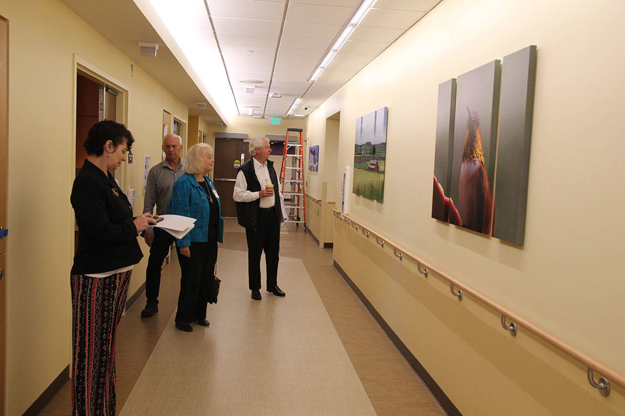 Health Board commissioners get a tour of the new addition to WhidbeyHealth Medical Center Monday. Panoramic photos taken by local residents show off all aspects of Whidbey Island. Photo by Patricia Guthrie/Whidbey News Group