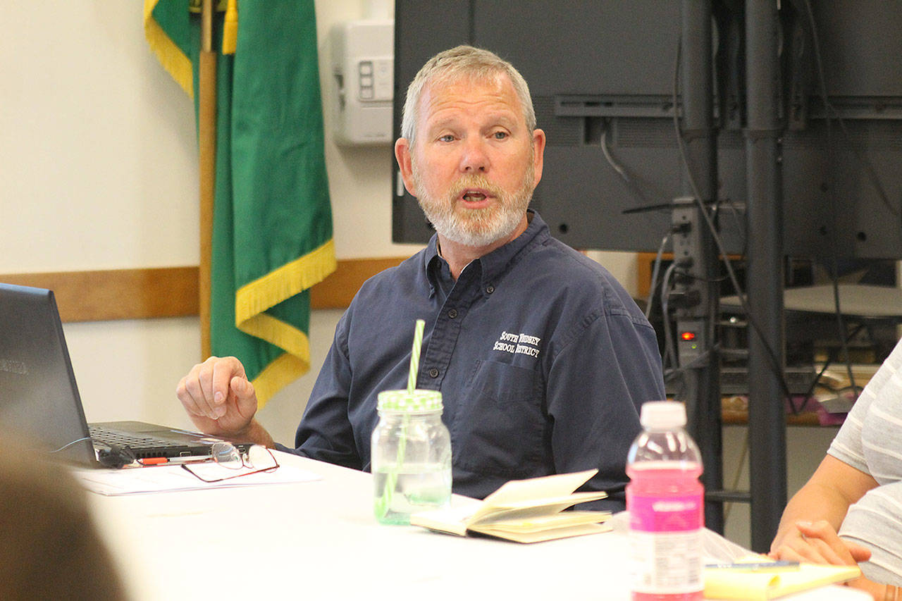 Evan Thompson / The Record &mdash; Dan Pooman, South Whidbey School District&rsquo;s assistant superintendent of business, discusses the 2017-18 school budget with the South Whidbey School Board at a workshop meeting on July 12.