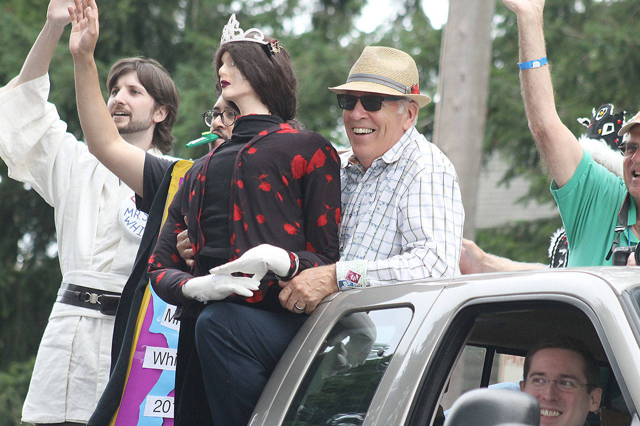 Evan Thompson / The Record &mdash; Daniel Goldsmith, 71, with his mannequin &ldquo;Myrtle&rdquo; during Saturday&rsquo;s parade at the Whidbey Island Fair. Goldsmith will tote Myrtle around during the upcoming Whidbey Triathlon on July 29 as a way of raising awareness about the Friends of Friends Medical Support Fund and 2017 Mr. South Whidbey contest.