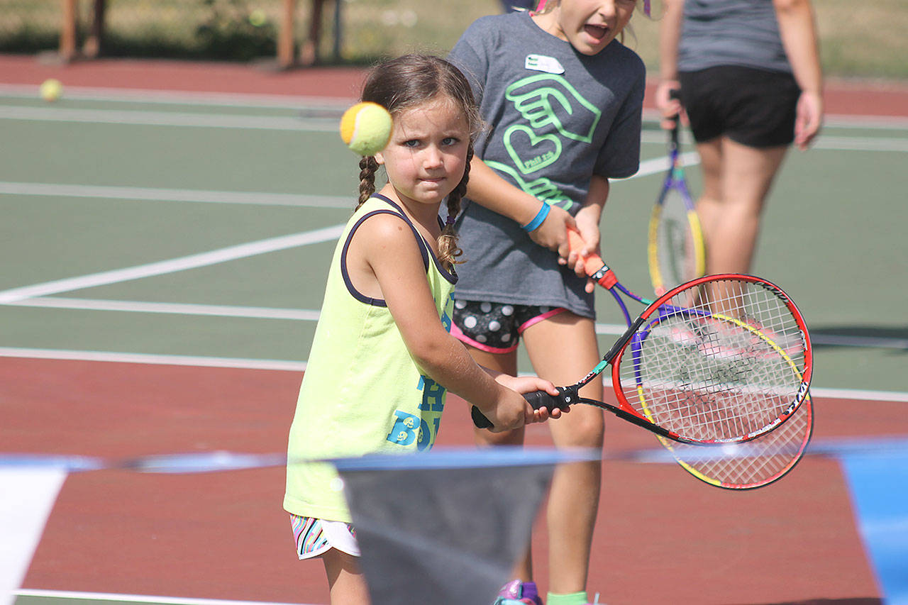 Evan Thompson / The Record — Jayda Coleman, 5, eyes the approach of a tennis ball during the third and final day of the Mega Sports Camp at South Whidbey High School.