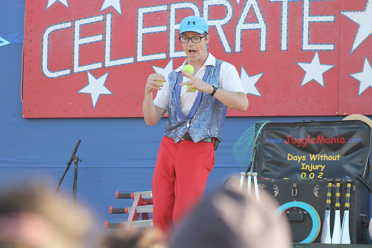 Evan Thompson / The Record — Rhys Thomas, a juggler, performed at the Celebrate America event on Monday, July 3 at Freeland Park.