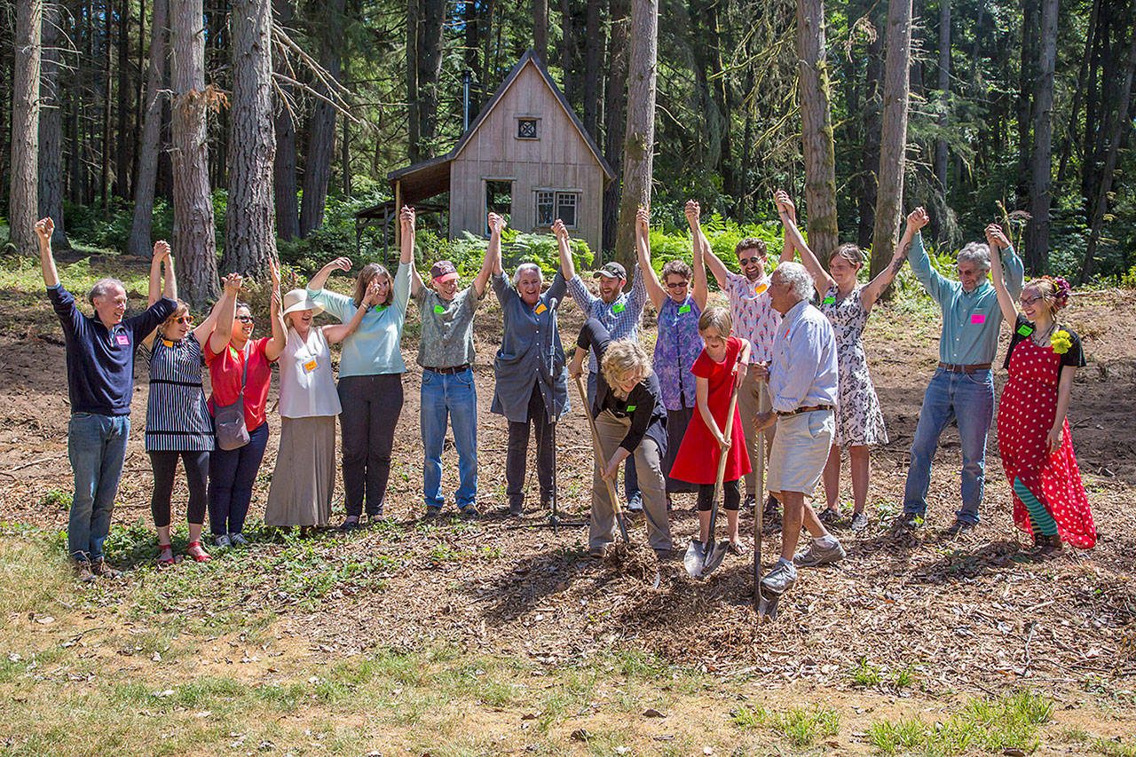 Michael Foley photo — Community members, staff, and builders celebrate in front of the future site of Meadow Row North.