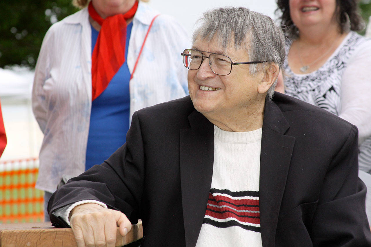 File photo                                Wallie Funk appears at a ceremony in Oak Harbor several years ago to acknowledge his gift of a sculpture to the city.                                 The former newspaper man died Aug. 12.                                File photo &mdash; Wallie Funk appears at a ceremony in Oak Harbor several years ago to acknowledge his gift of a sculpture to the city.