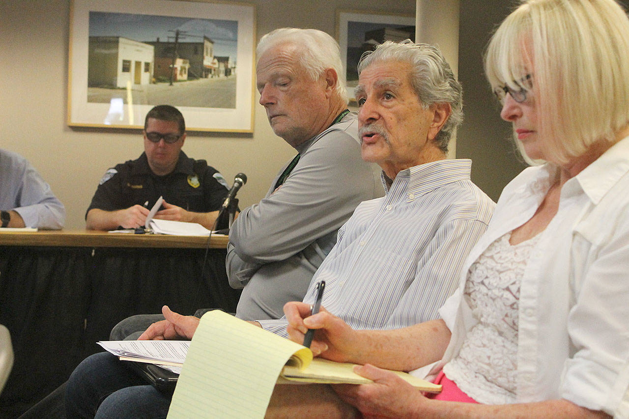 Evan Thompson / The Record — Langley Arts Commission Chairman Frank Rose addresses the Langley City Council during a workshop meeting on Tuesday at city hall. Also in the picture are (from left to right) Langley Police Chief David Marks, Mo Jerome and Joann Quintana.