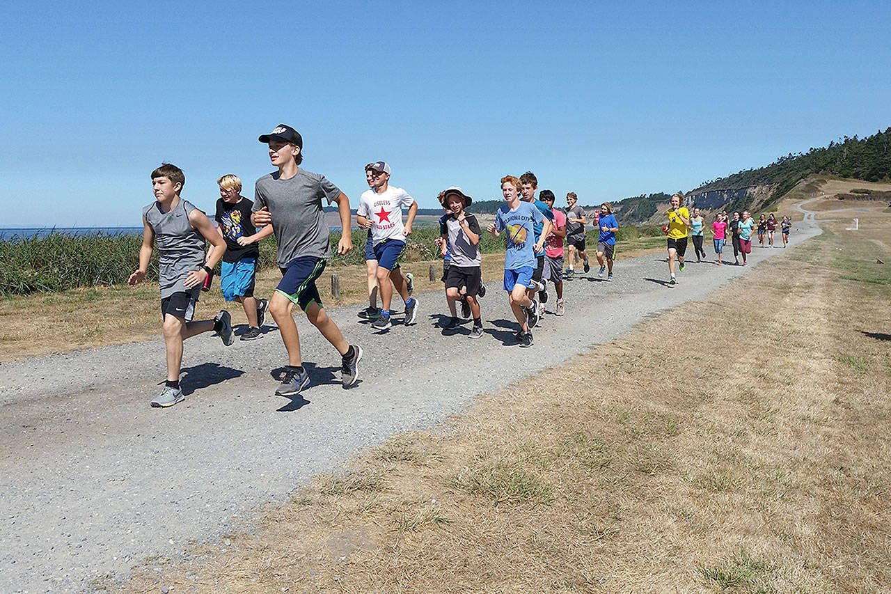 Doug Fulton photo — South Whidbey’s cross country team practiced at Fort Ebey in Coupeville during the preseason, which is an annual tradition.