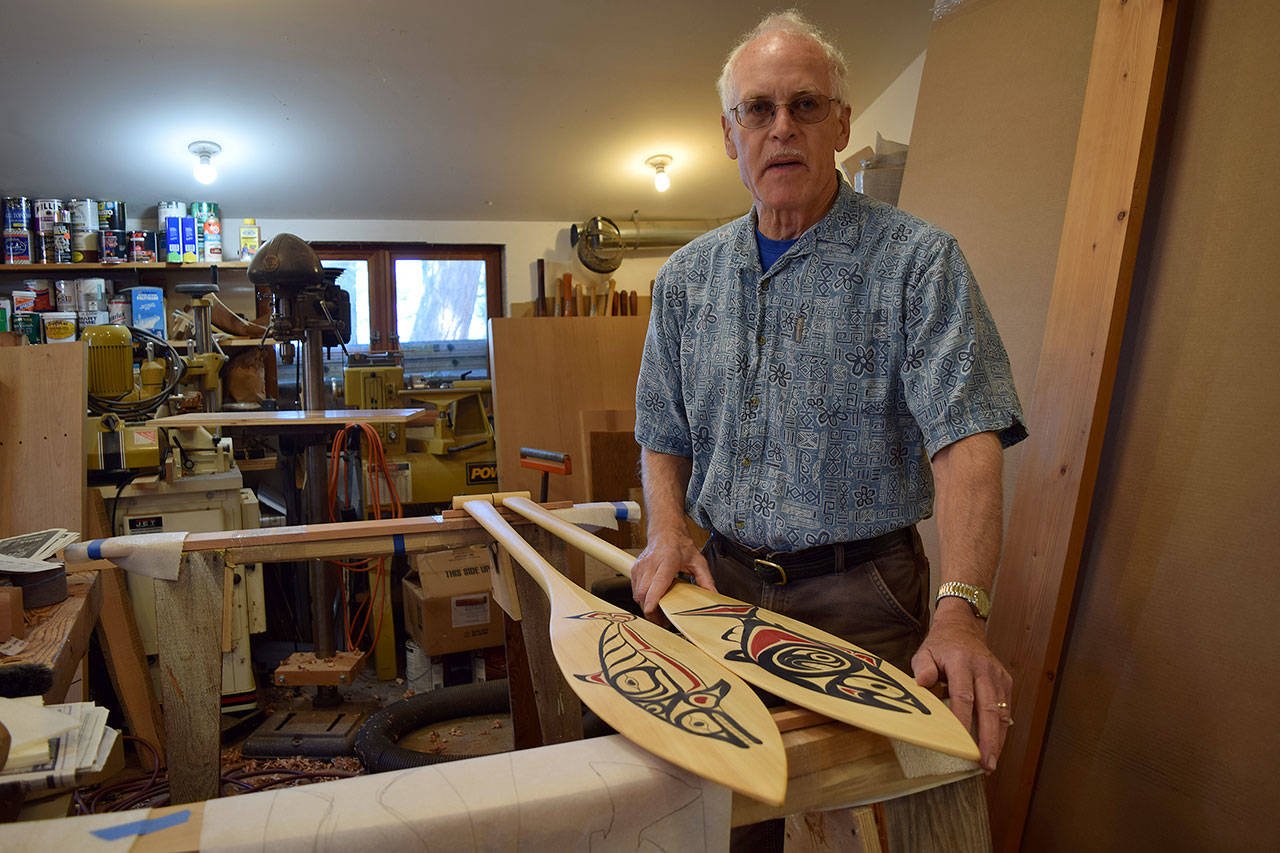 Kyle Jensen / The Record — Langley woodworker Bruce Schwager will showcase two canoe paddles decorated with Northwest native art at Woodpalooza.