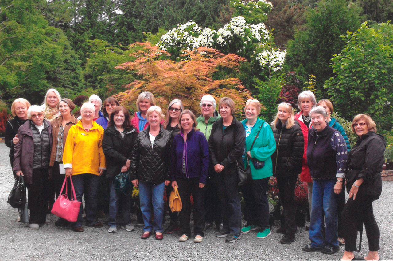 Contributed image — Members of the South Whidbey Nightcrawlers Garden Club pose for a photo at Venture Out in June. The organization celebrates its 37th anniversary this month.