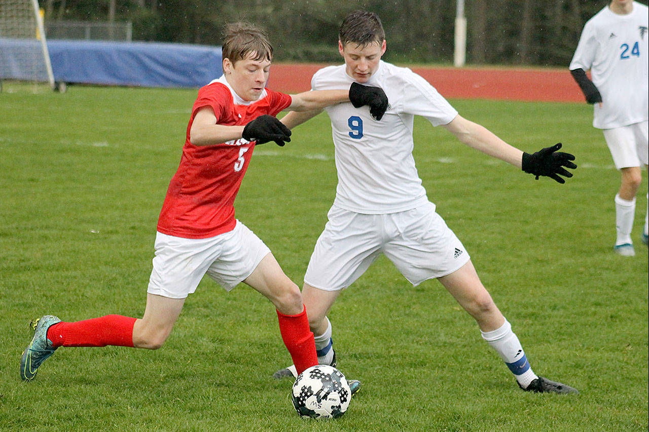 Record file                                 South Whidbey&rsquo;s Ari Rohan battles for possession during a match against King&rsquo;s in April 2017. King&rsquo;s and Cedar Park Christian have applied to transfer from the Cascade Conference to the Emerald City League.