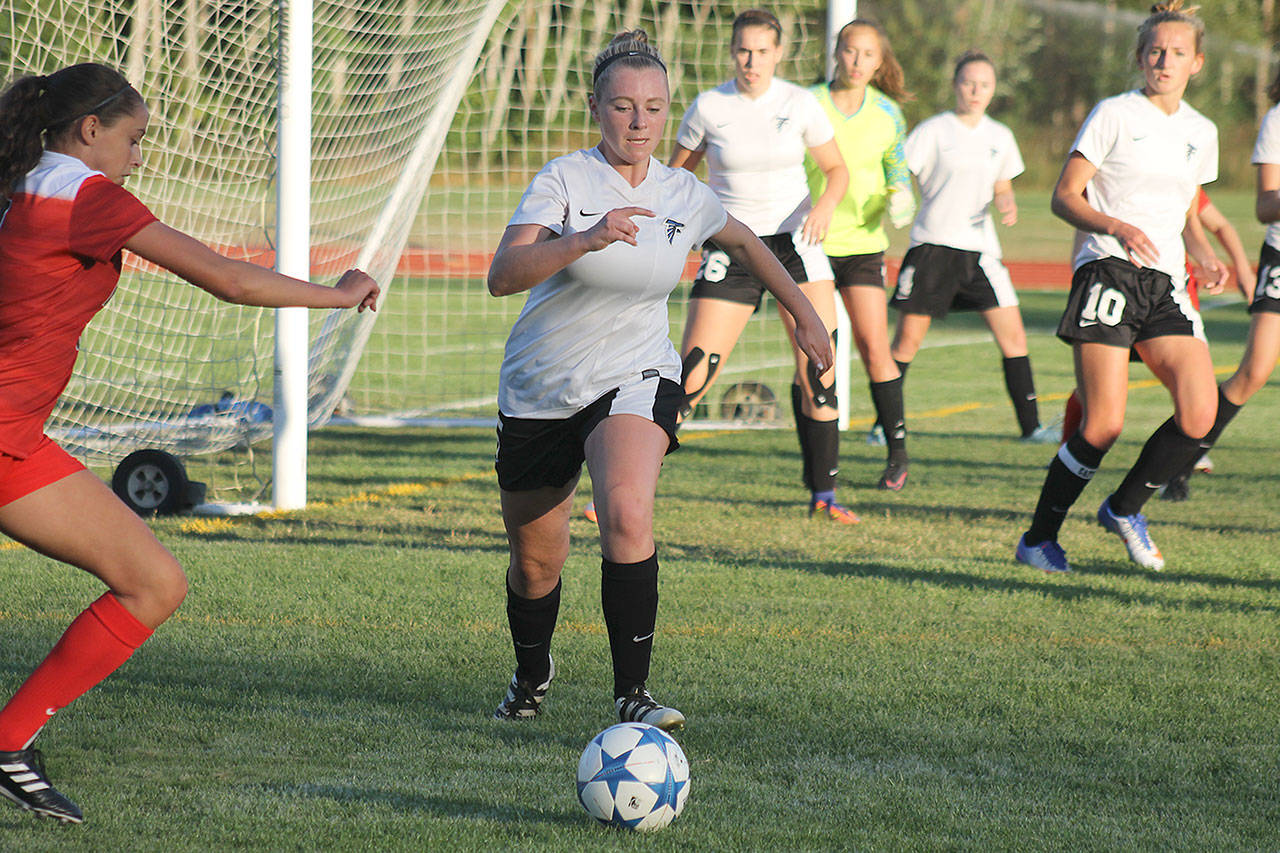 Evan Thompson / The Record — South Whidbey junior defender Maddy Drye stops an attack by a King’s player during a match on Sept. 14.