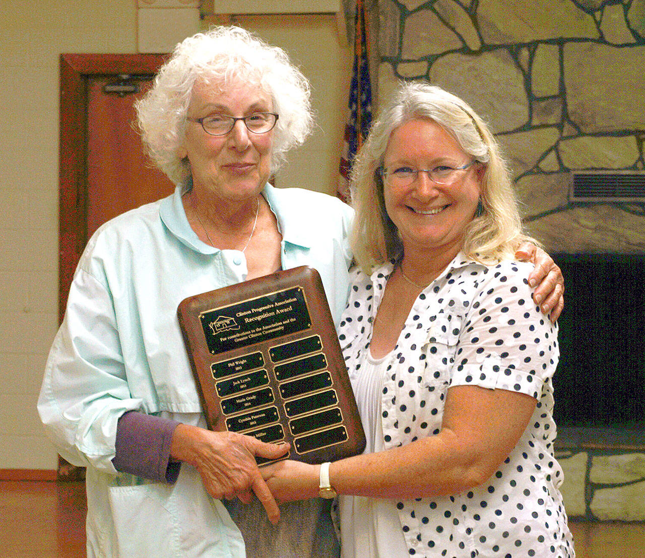 Contributed photo — Clinton resident Elisa Miller, left, received the volunteer of the year award from the Clinton Progressive Association in September. Catherine Billera, president of the Clinton Progressive Association, presented the award.