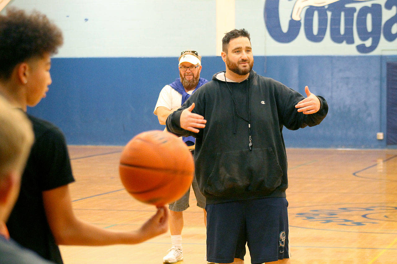 Evan Thompson / The Record — Josh Coleman, South Whidbey Middle School’s boys basketball head coach, speaks to the team during during practice on Thursday afternoon at Langley Middle School’s main gymnasium.