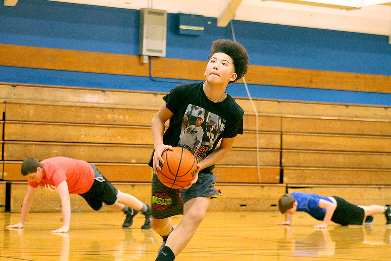 Evan Thompson / The Record &mdash; South Whidbey Middle School eighth-grader Jacob Eg prepares for a layup during practice on Thursday afternoon at Langley Middle School&rsquo;s main gymnasium. The gym will receive a nearly $1 million seismic retrofit sometime in 2018.
