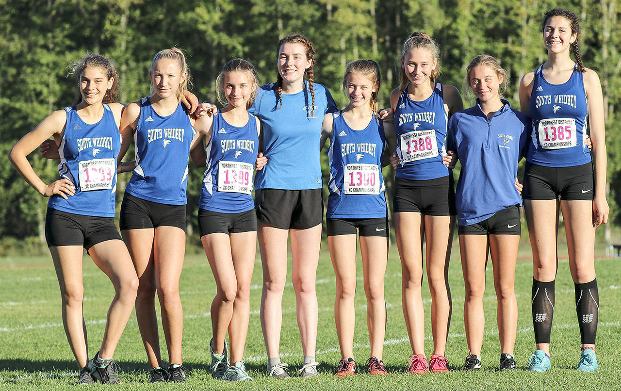 Matt Simms photo — South Whidbey’s girls cross country team qualified for the class 1A state cross country championships on Nov. 4 in Pasco. From left to right: Cecilia Cobbs, Laila Gmerek, Natalie Rodriguez, Elizabeth Donnelly, Kaia Swegler Richmond, Serena McLain, Alexandra Kurtz and Flannery Friedman.