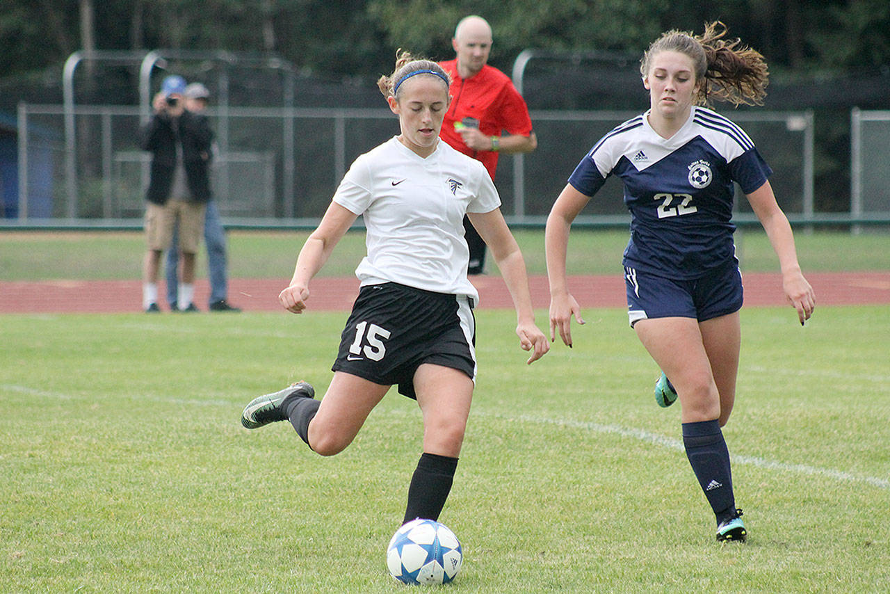 Evan Thompson / The Record — South Whidbey sophomore Ashley Ricketts dribbles during a regular season match against Sultan in September. The Falcons are one win shy of a state berth.