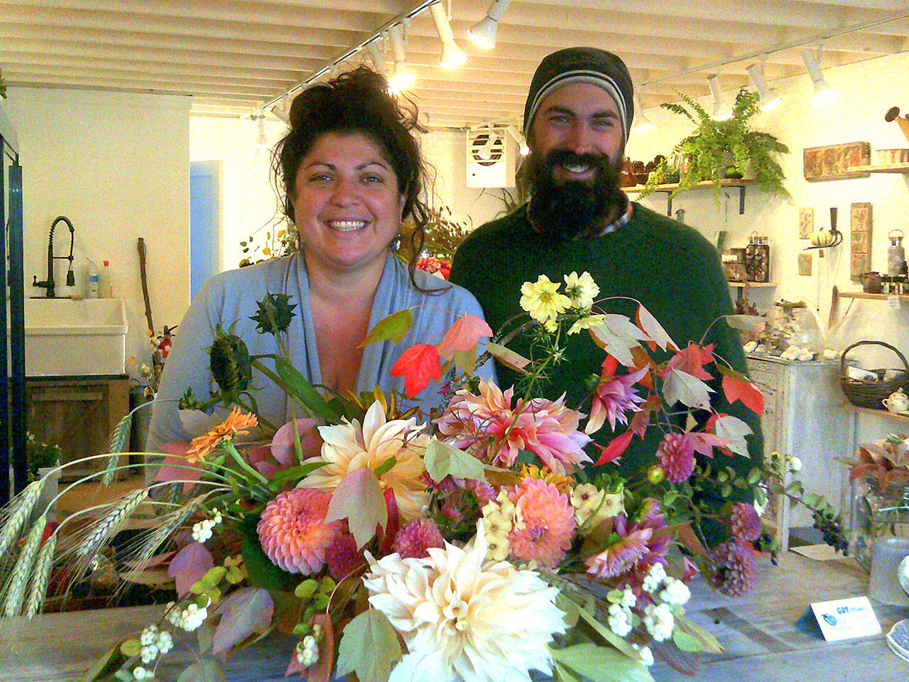 Contributed image &mdash; Melissa Brown and Ben Courteau recently opened the Flying Bear flower shop on First Street.