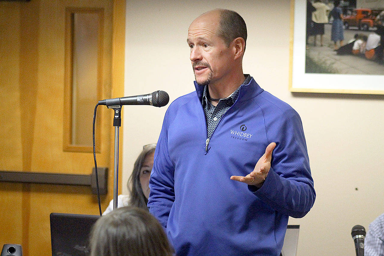 Evan Thompson / The Record &mdash; Whidbey Telecom Co-CEO George Henny spoke to the Langley City Council about his plans for the &ldquo;Little Red Building&rdquo; that is currently located on Third Street and DeBruyn Avenue.