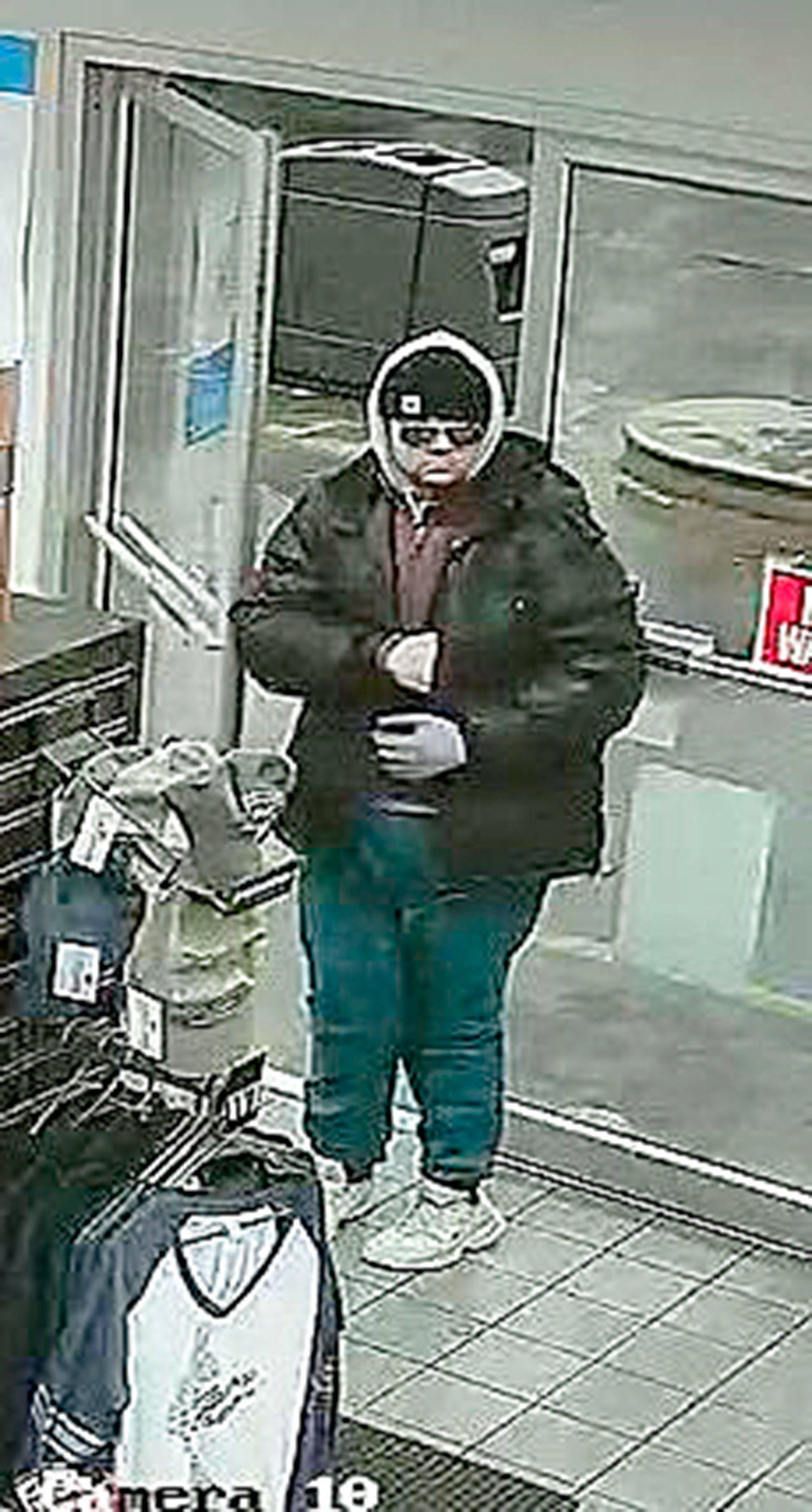 Photo courtesy of Island County sheriff                                A robber struck a Clinton gas station Sunday. The suspect may be the same person as a Halloween night robbery.