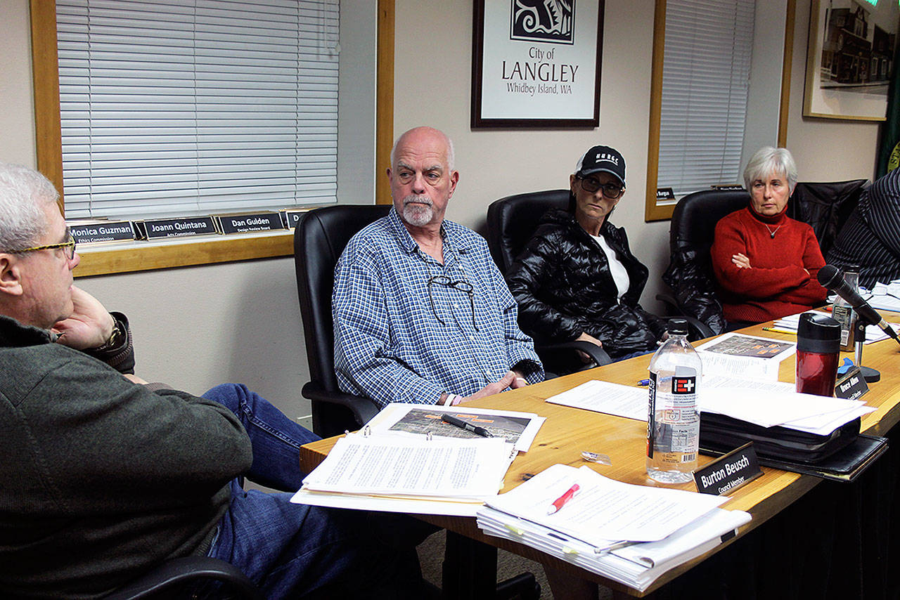 Evan Thompson / The Record  The Langley City Council voted 3-0 to adopt an inclusive city ordinance on Monday night at city hall. Councilman Bruce Allen, second from the left, was instrumental in bringing it back after it was shelved in June, despite opposing it earlier this year.