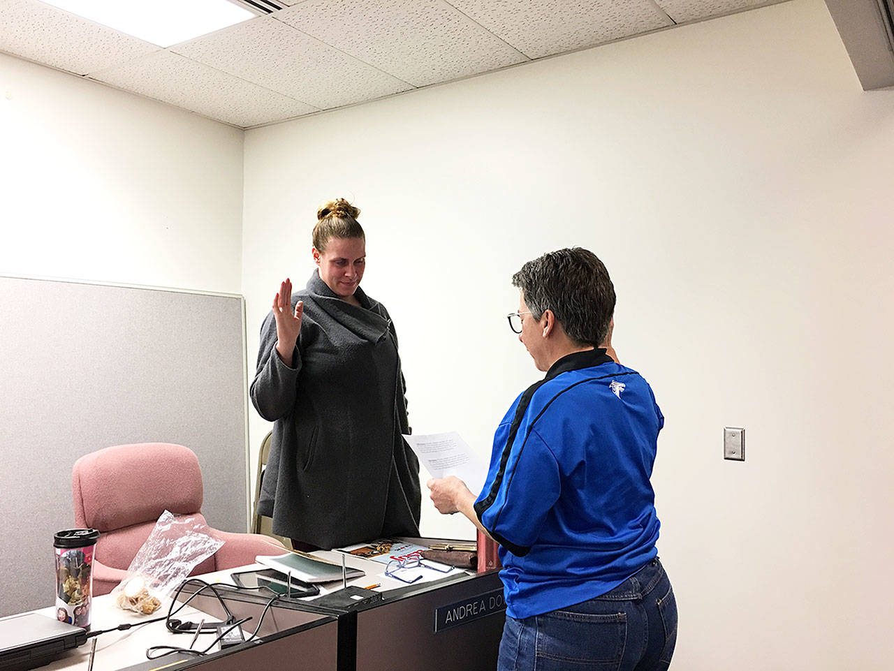 Contributed photo — Freeland resident Andrea Downs takes her oath of office from South Whidbey School District Superintendent Jo Moccia at the South Whidbey School Board’s monthly meeting on Dec. 13 at South Whidbey Elementary School. Downs was elected to position 2 on the board.