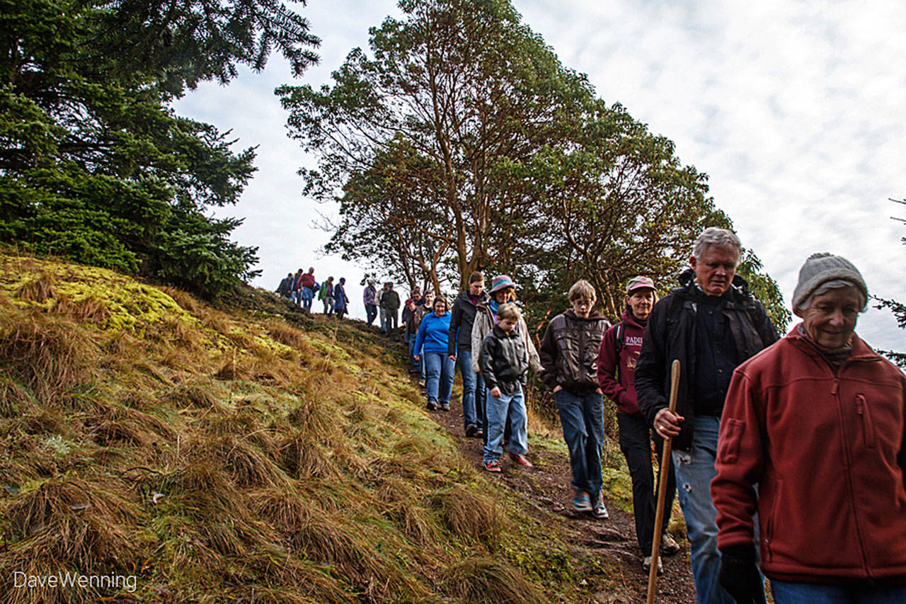 Hikers descend a trail in Deception Pass State Park, which again will host a guided First Day Hike. It’s also a Discover Pass free day. Photo provided by Dave Wenning