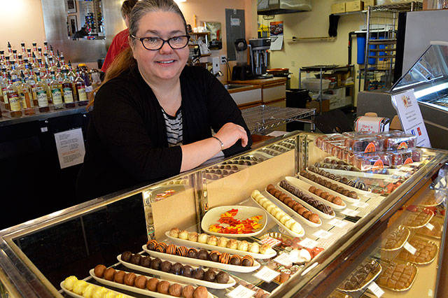 Langley chocolatier Mona Newbauer offers a wide variety of gourmet chocolates in her shop, Sweet Mona’s. Some of those chocolates will make their way to Coupeville Saturday for the annual Chocolate Walk. Photo by Megan Hansen/Whidbey News-Times