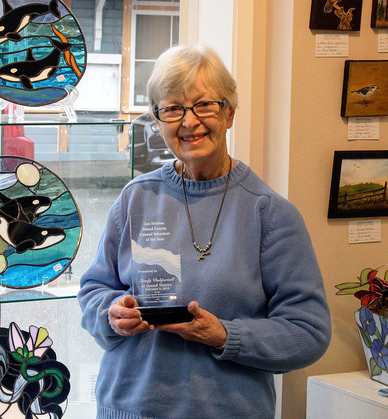 Jill Hein photo — Coupeville resident Sandy Dubpernell holds her Jan Holmes Island County Volunteer of the Year award plaque.