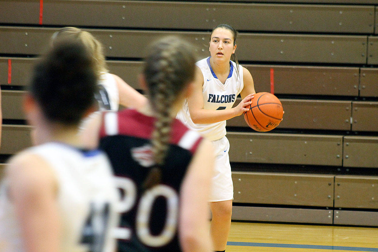 Evan Thompson / The Record — South Whidbey sophomore Farriss Jokinen looks for an opening against Cedarcrest on Dec. 8 at Erikson Gymnasium. The Falcons ended the season 7-15 overall, but made the postseason.