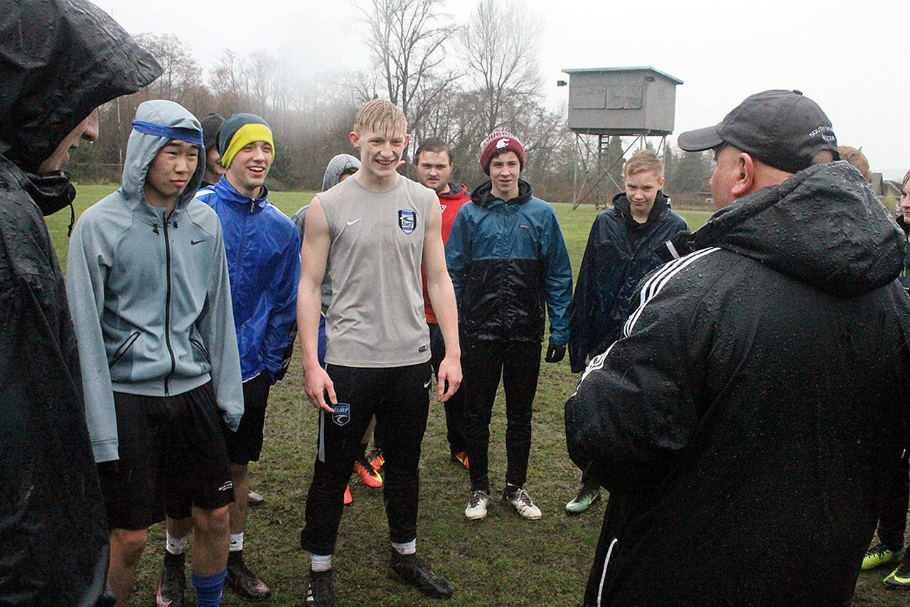 Evan Thompson / The Record — South Whidbey boys soccer coach Emerson “Skip” Robbins talks with players.