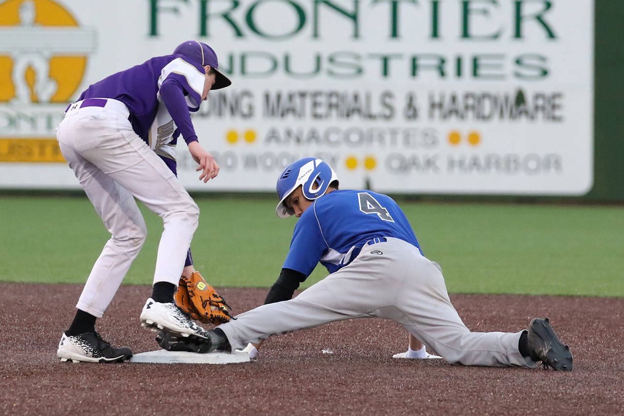 Alex Black reaches second base safely against Oak Harbor in Thursday’s jamboree. (Photo by John Fisken)