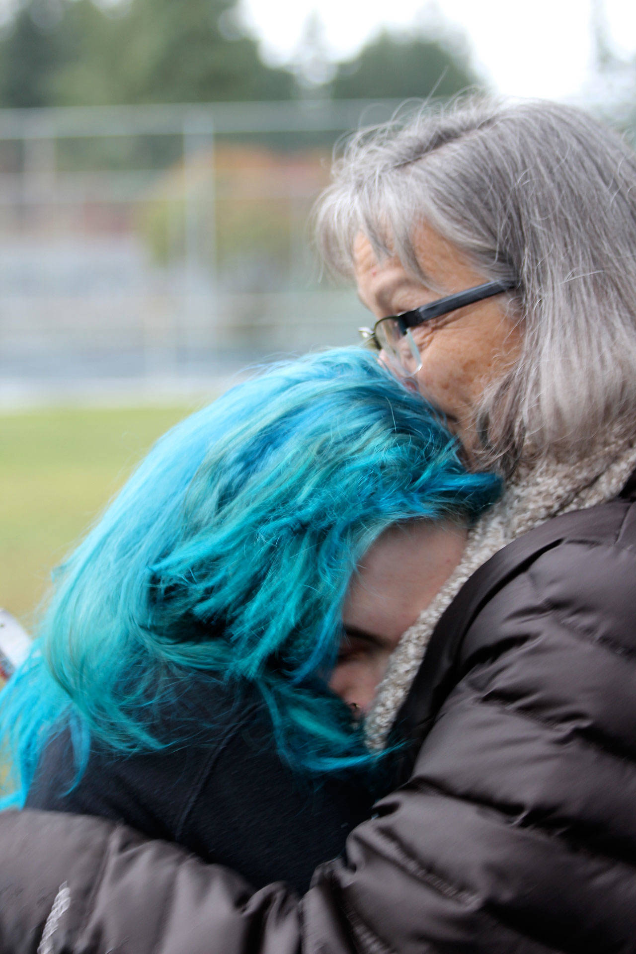 Diana Nielson hugs her daughter, Elijah Frisbie, a junior at South Whidbey High School, after Frisbie participated in the school walkout.                                Photos by Patricia Guthrie/Whidbey News Group
