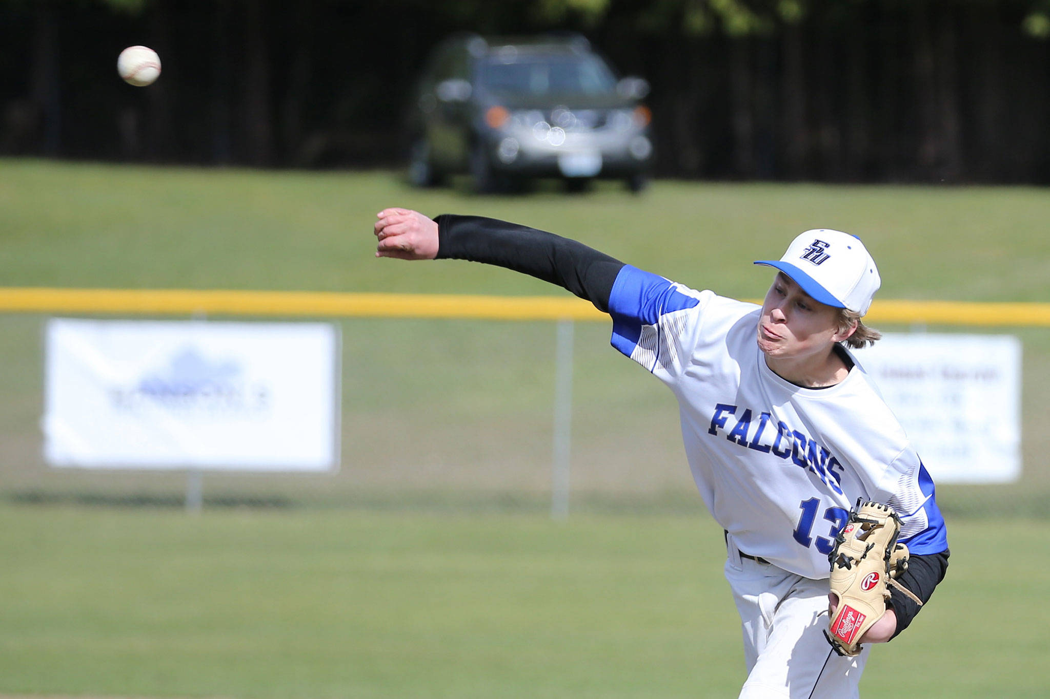 South Whidbey High School’s Drew Fry fires a pitch against Coupeville Saturday.(Photo by John Fisken)