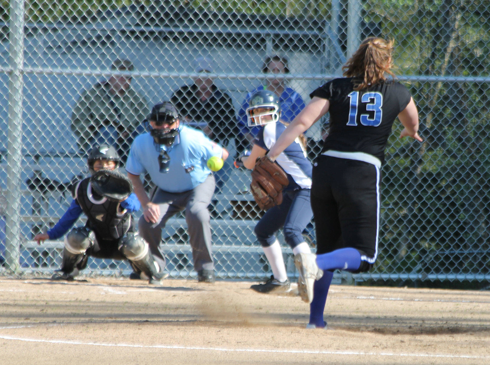 South Whidbey pitcher Mackenzee Collins tosses a strike to catcher Ari Marshall in the win over Cedar Park Christian Monday. Collins finished with a three-hitter and 16 strikeouts. (Photo by Jim Waller/Whidbey News Group)